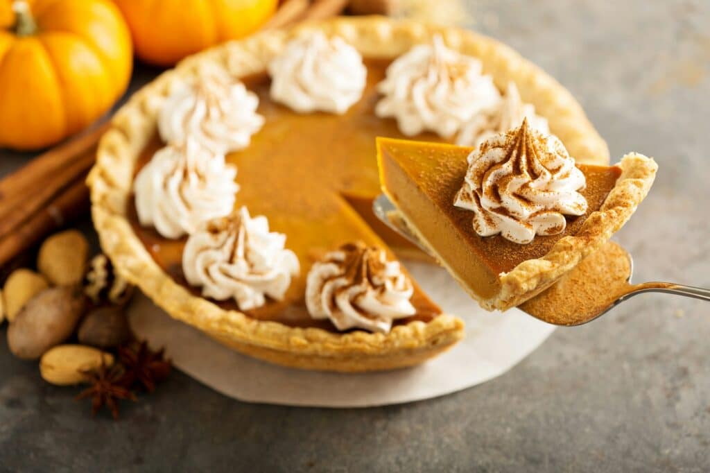 Pumpkin pie with whipped cream